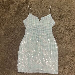 Sequin dress with an open back! This dress also has removable cup pads!